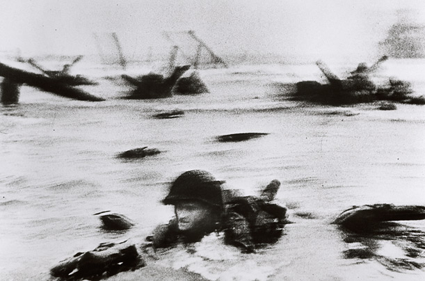 These images of Omaha Beach were shot by Robert Capa, who landed with the 16th Regiment of the U.S. Army First Infantry in the first wave.first wave of 